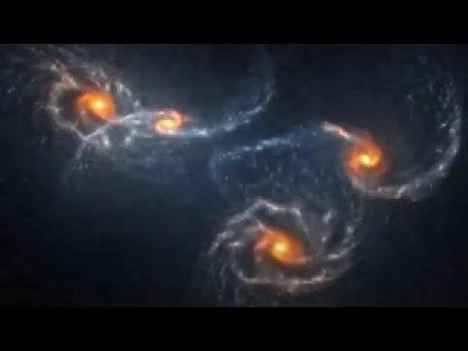Four galaxies interacting and merging together (N-body simulation)