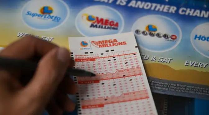 Mega Millions jackpot hits $910 million. Here’s the tax bill if you win