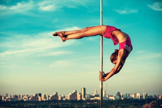 Pole Dance Fitness: Unveiling the Physical, Mental, and Emotional Benefits