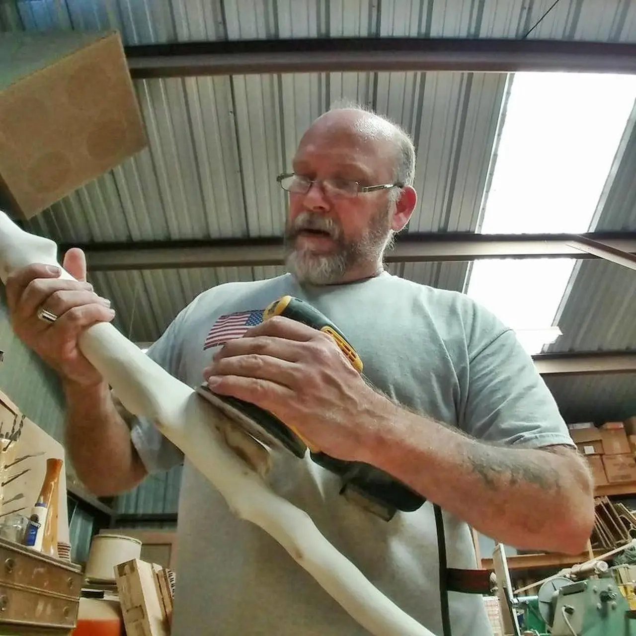 Retired Navy veteran Oscar Morris in his workshop in the city of Eustis in Lake County, Fla. (Courtesy of <a href="https://www.facebook.com/Veterancanes/">Free Canes For Veterans</a>)