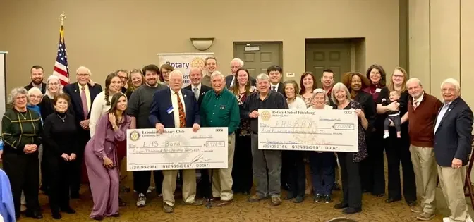 Twin Cities Rotary clubs deliver $16K to school bands