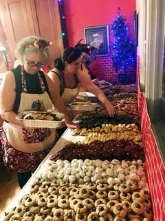 Justina Flynn (left) finishing up the 2018 cookie batch. (Courtesy of Cookies for the Troops LLC)