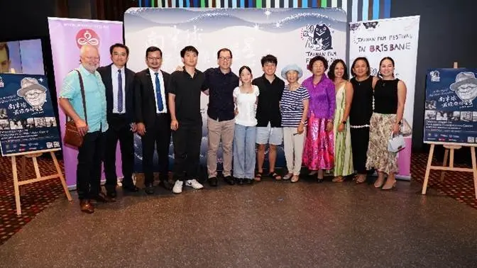 A group of people standing together

AI-generated content may be incorrect.