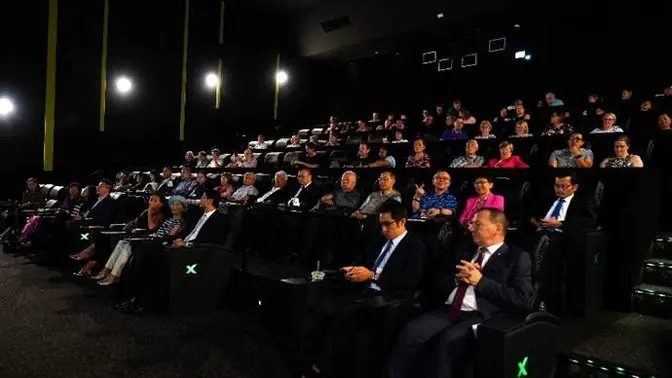 A group of people sitting in chairs

AI-generated content may be incorrect.