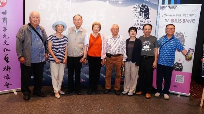 A group of people standing together

AI-generated content may be incorrect.